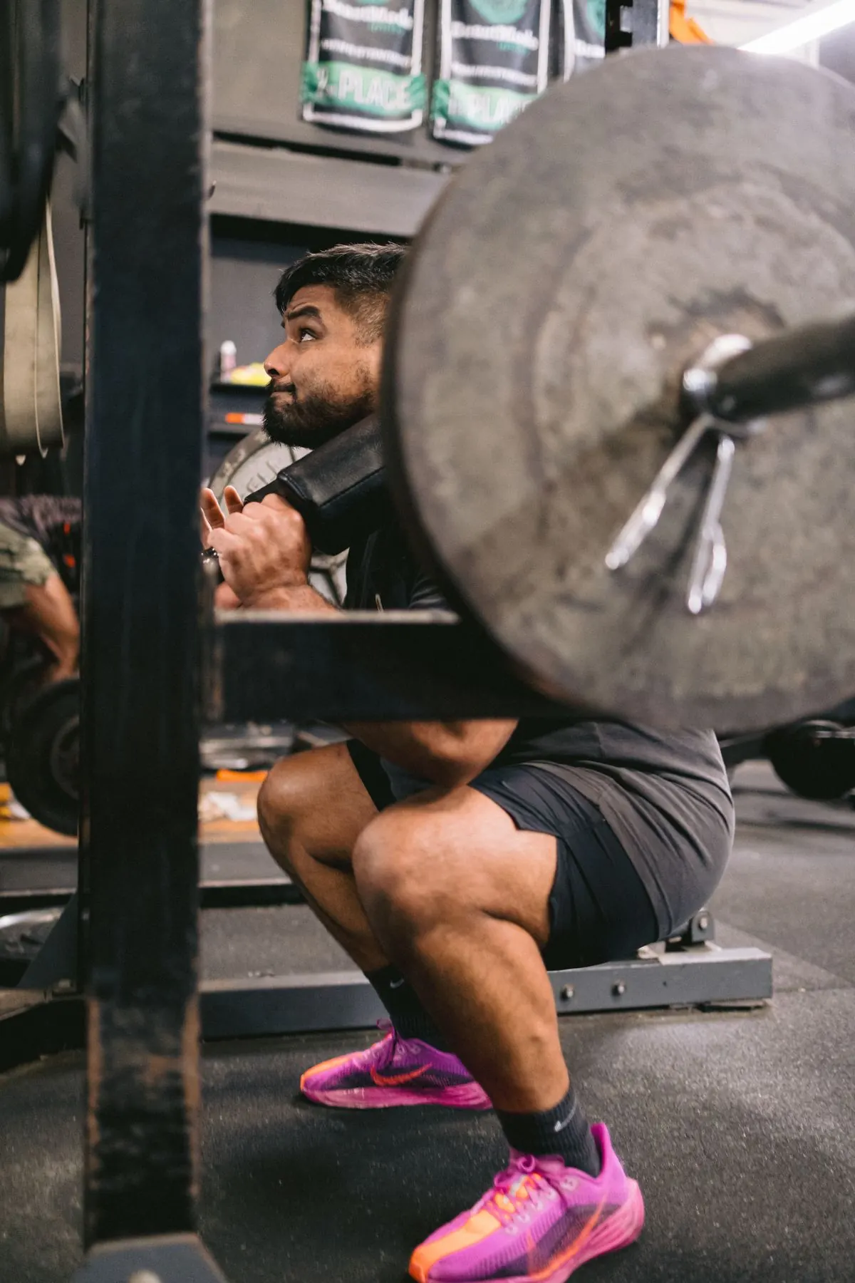 BOSX athlete at the bottom of a heavy back squat